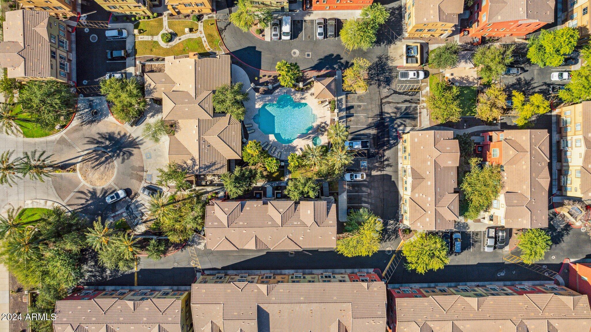 1920 East Bell Road, Unit 1161 Phoenix, AZ 85022 - Photo 35 of 37 a view of a house with a yard and sitting area