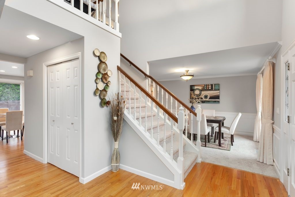 4513 Northeast 18th Street Renton, WA 98059 - Photo 9 of 25 a view of entryway and hall with wooden floor