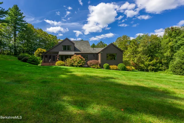 a view of a house with a big yard
