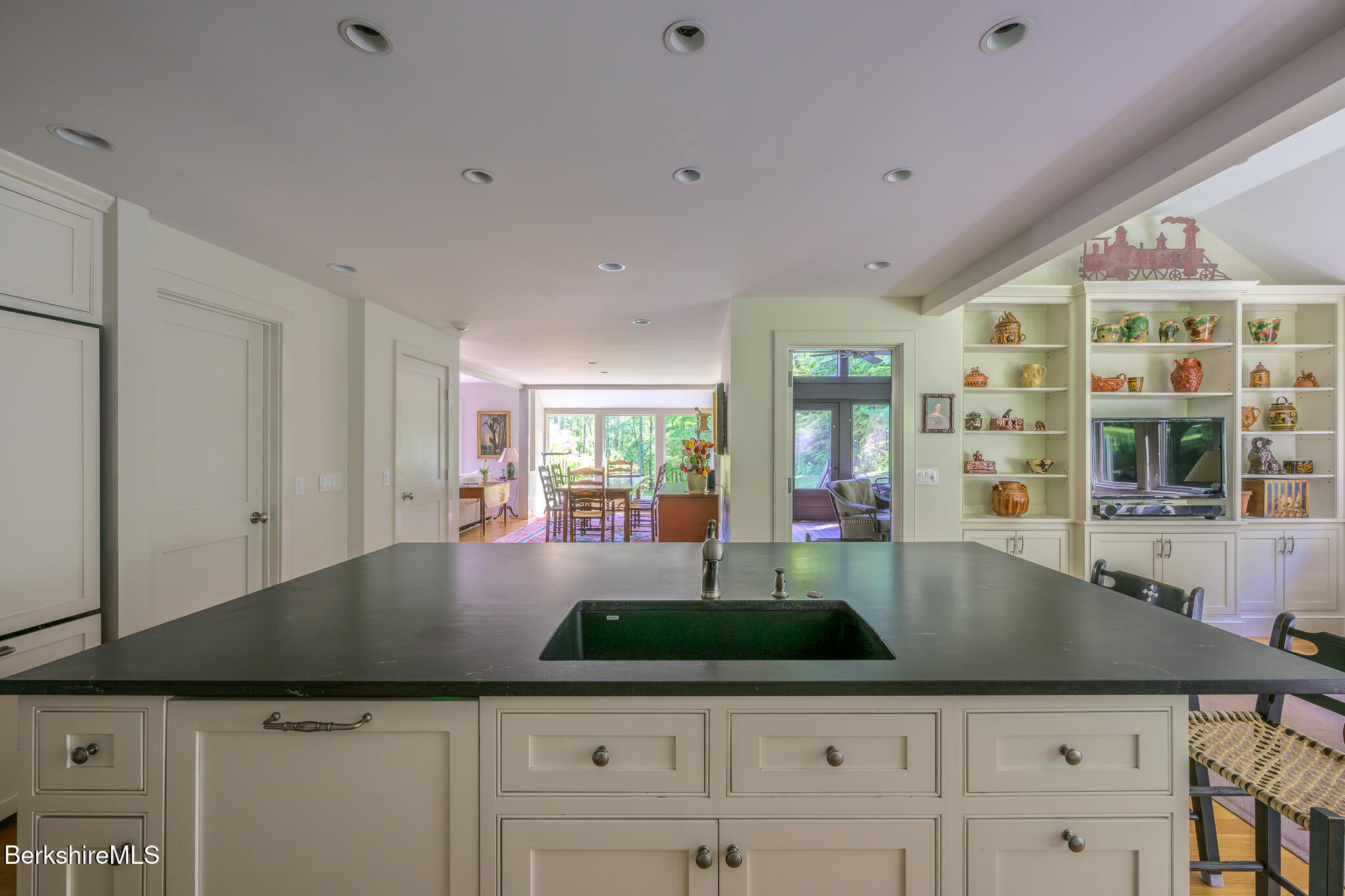 91 North Undermountain Road Egremont, MA 01230 - Photo 12 of 64 a kitchen with granite countertop a sink and cabinets
