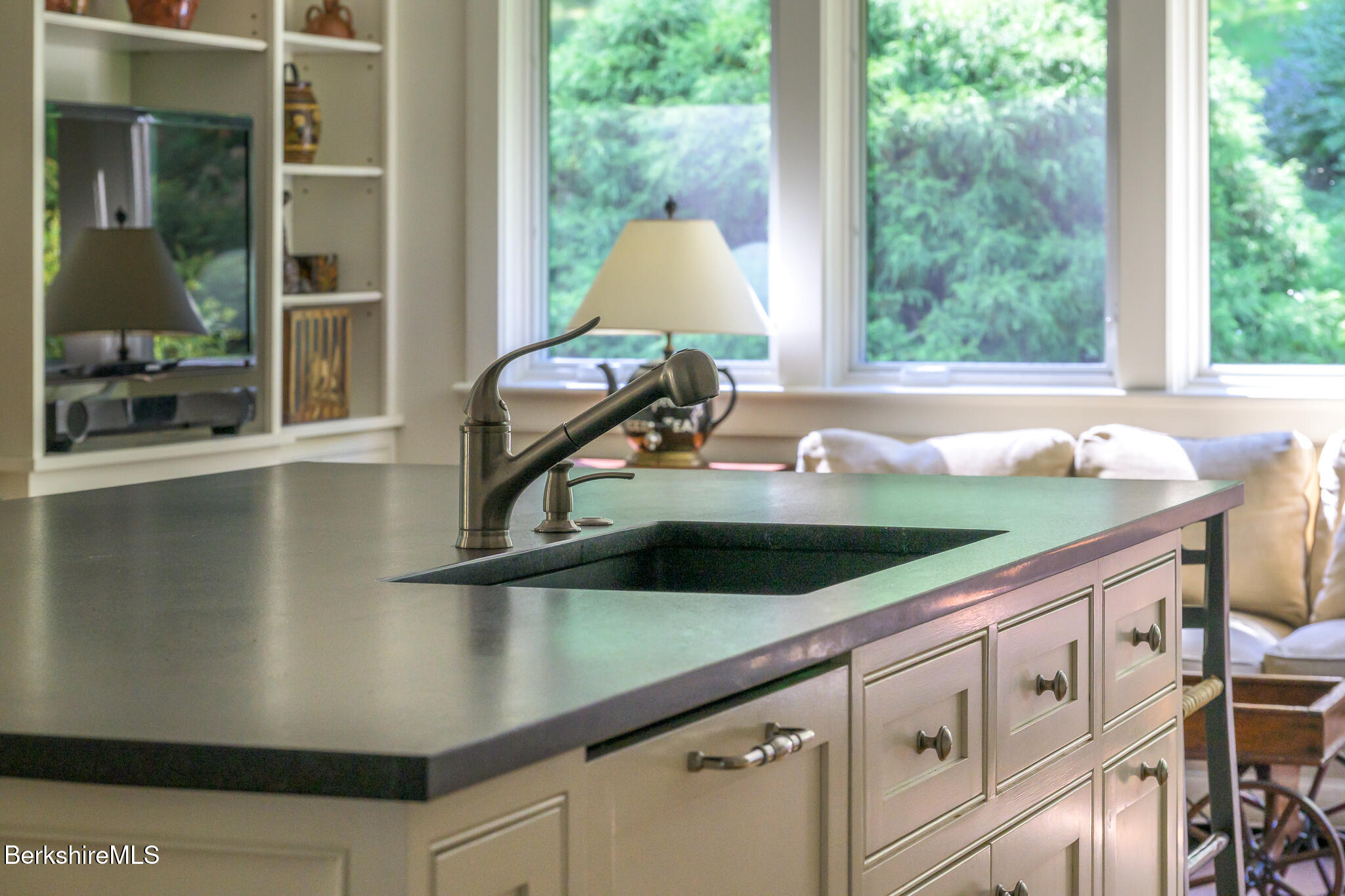 91 North Undermountain Road Egremont, MA 01230 - Photo 13 of 64 a kitchen with sink a window and a wooden floor