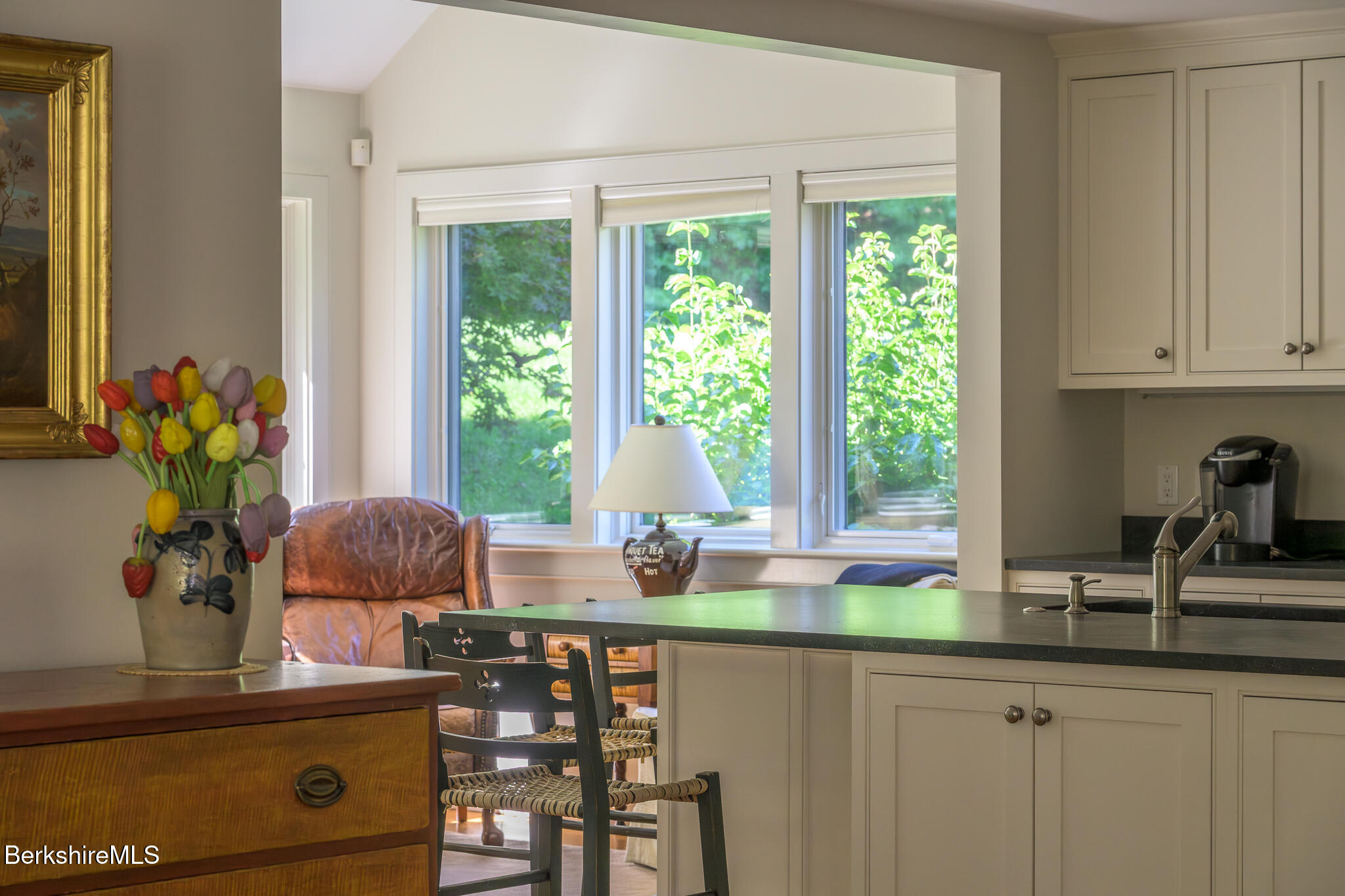 91 North Undermountain Road Egremont, MA 01230 - Photo 18 of 64 a kitchen with a window a sink and cabinets