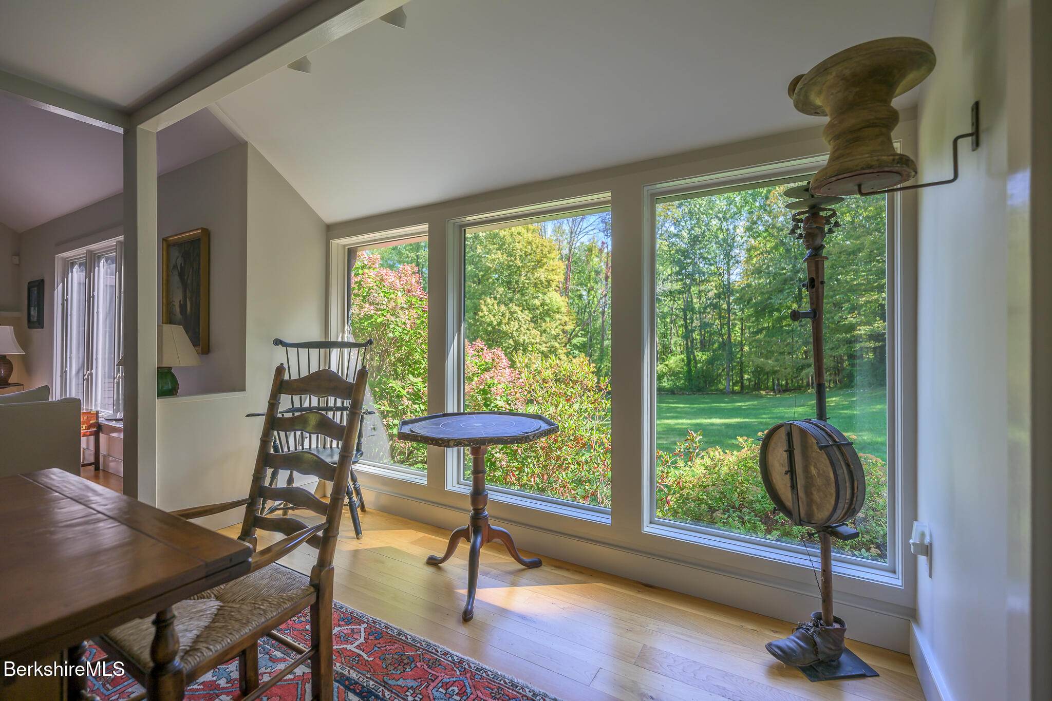 91 North Undermountain Road Egremont, MA 01230 - Photo 20 of 64 a view of a livingroom with furniture wooden floor windows and a chandelier