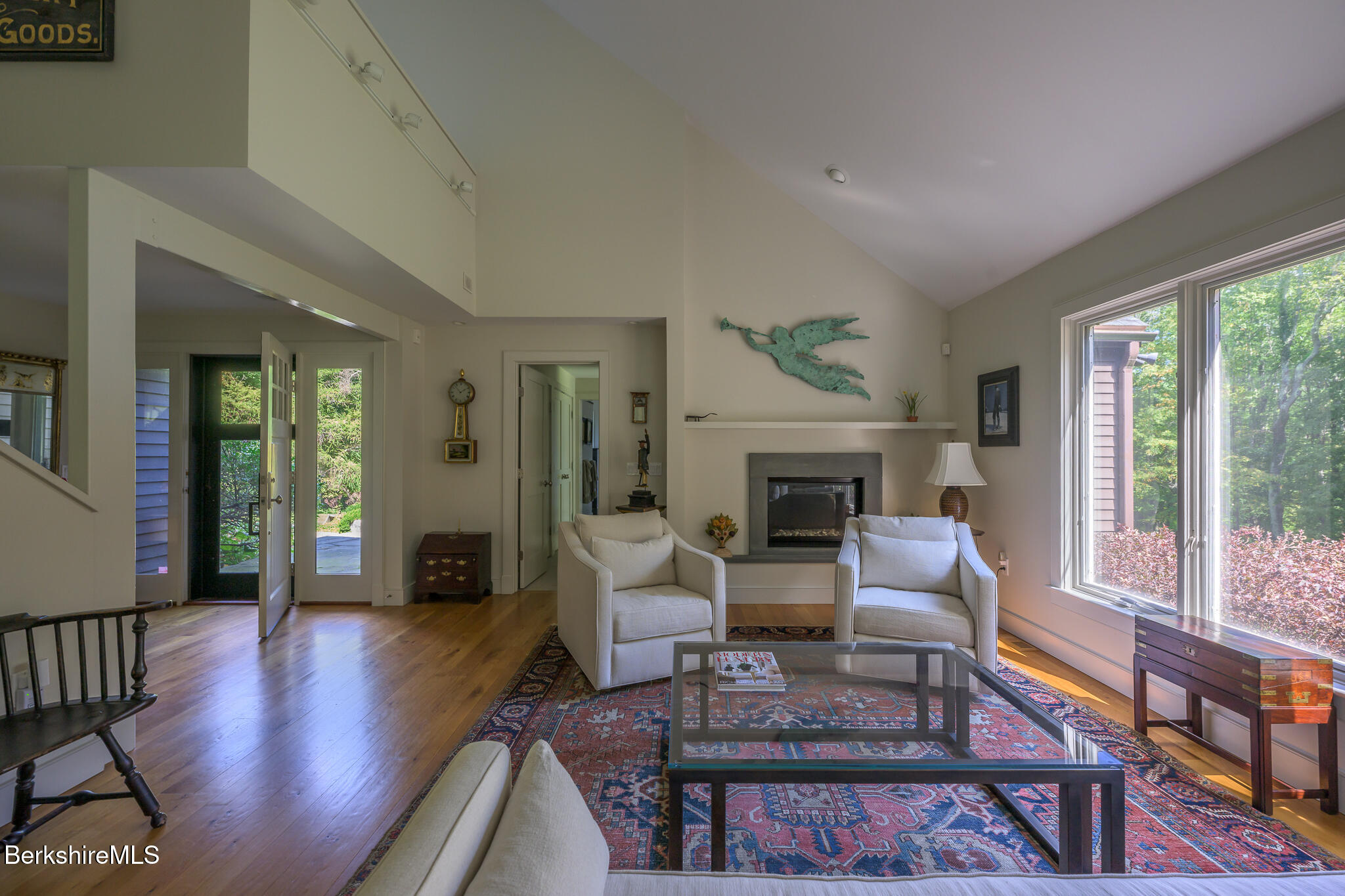 91 North Undermountain Road Egremont, MA 01230 - Photo 28 of 64 a living room with furniture fireplace and a table