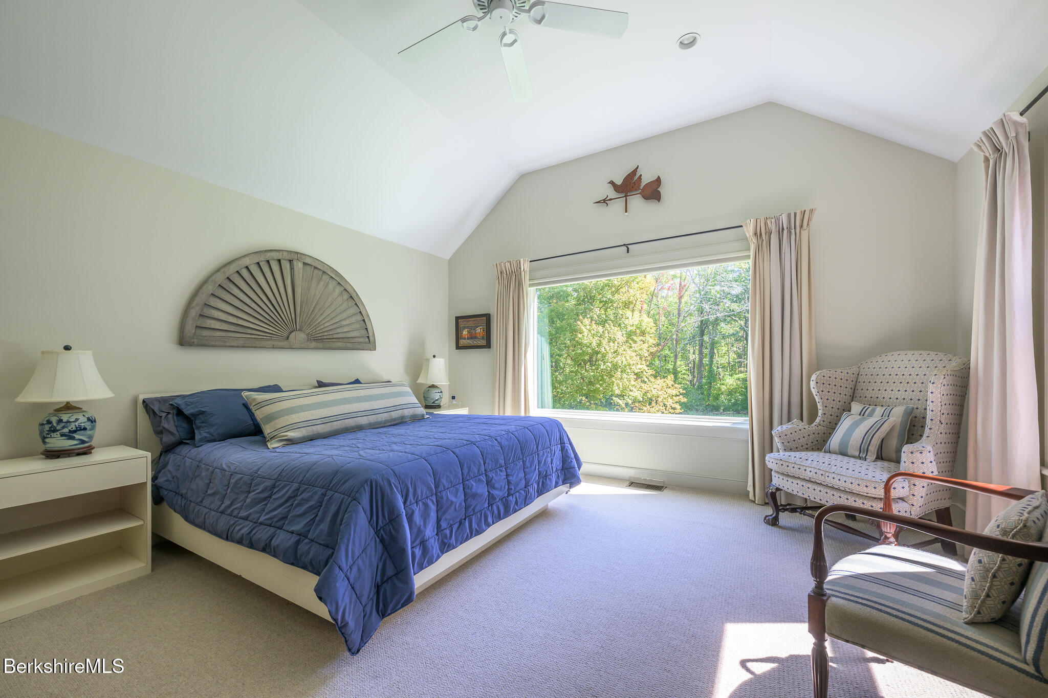 91 North Undermountain Road Egremont, MA 01230 - Photo 33 of 64 a bedroom with a bed and a couch