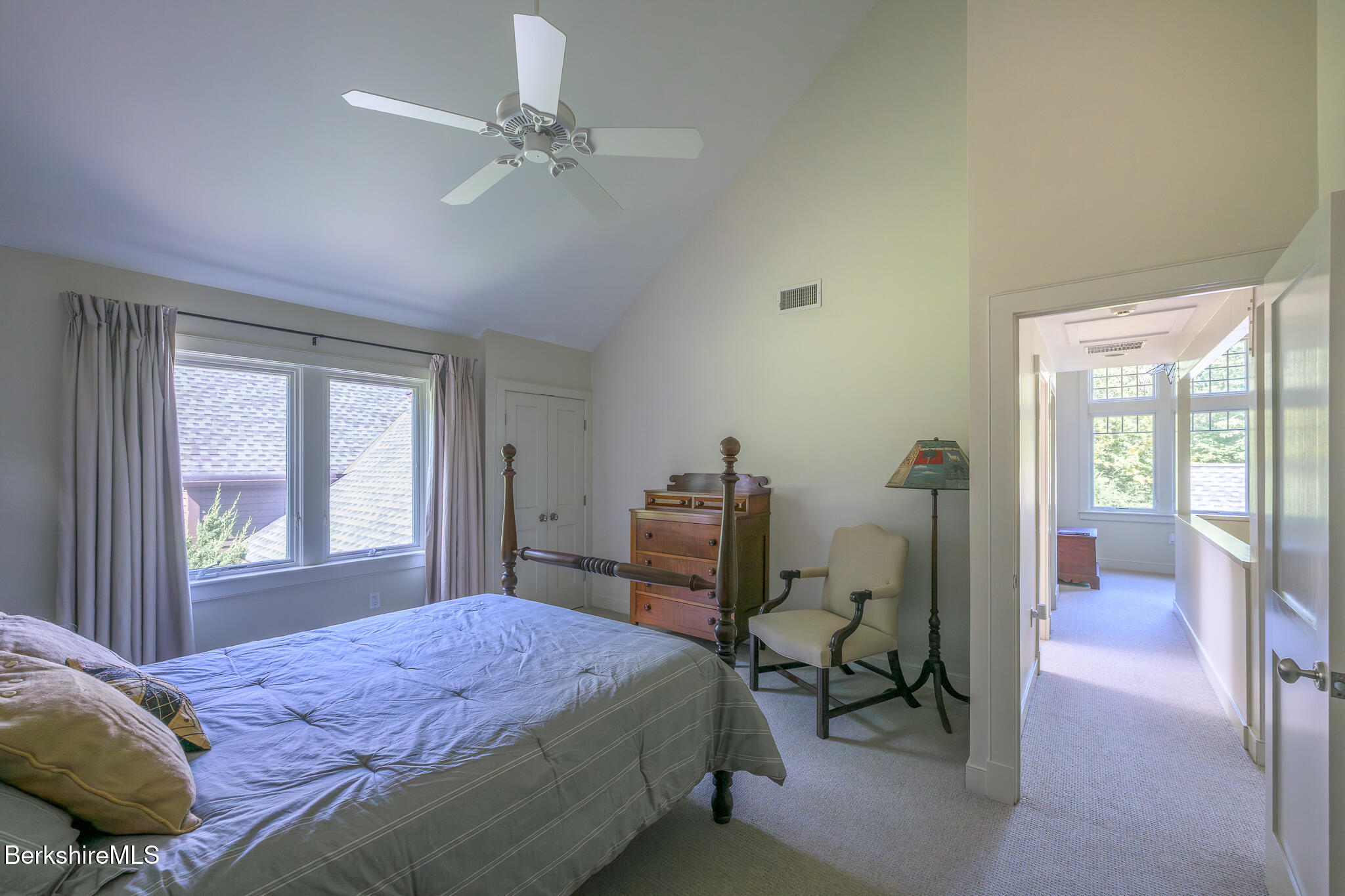 91 North Undermountain Road Egremont, MA 01230 - Photo 48 of 64 a bedroom with a bed and a chandelier