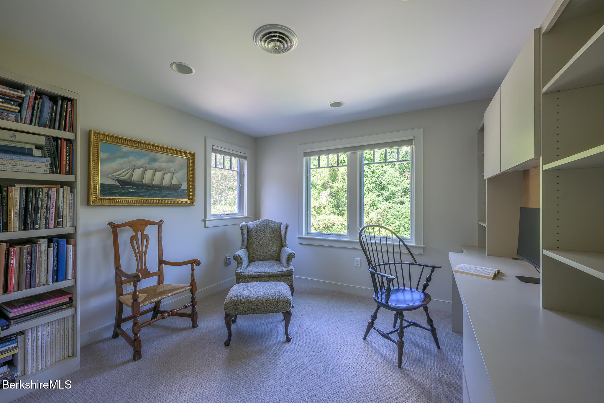 91 North Undermountain Road Egremont, MA 01230 - Photo 51 of 64 a living room with furniture and a book shelf