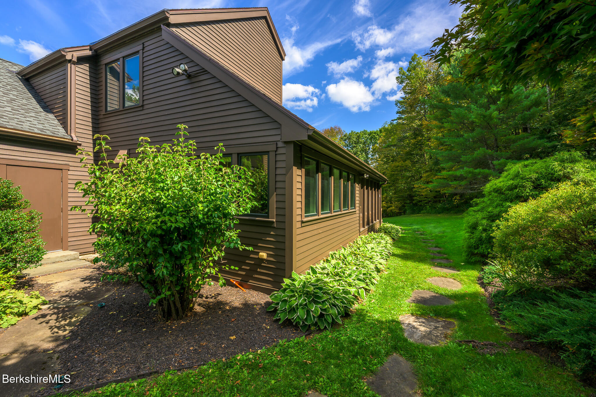 91 North Undermountain Road Egremont, MA 01230 - Photo 53 of 64 a backyard of a house with lots of green space