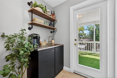 a view of balcony with garden and deck