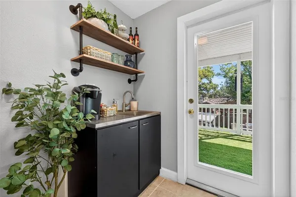a view of balcony with garden and deck