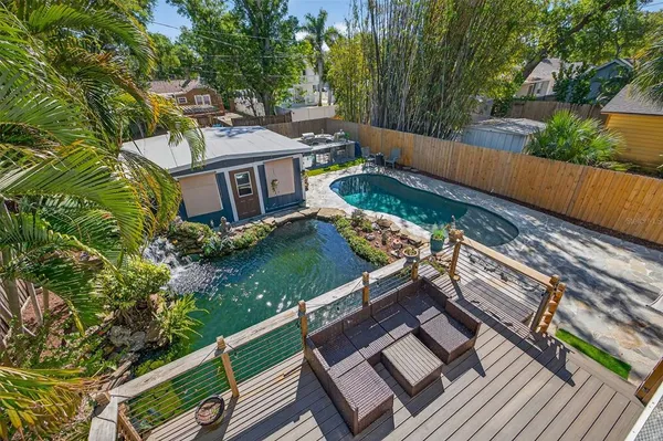a view of a house with backyard