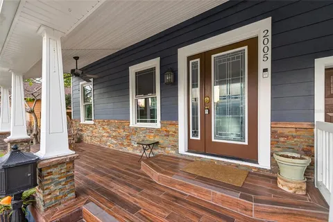 a view of a house with a bench