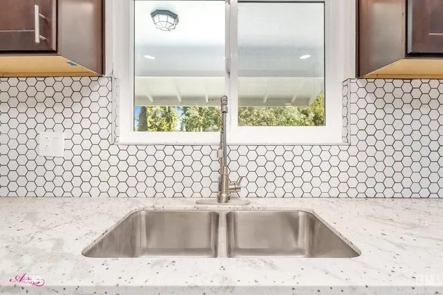 a bathroom with a sink and a bathtub