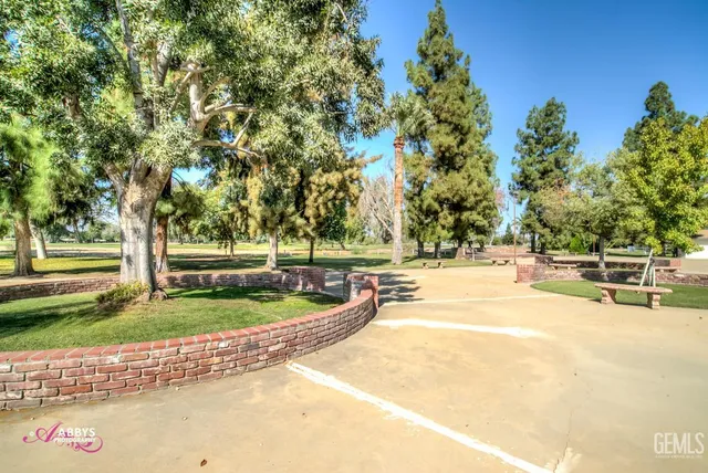 a view of a swimming pool with a patio