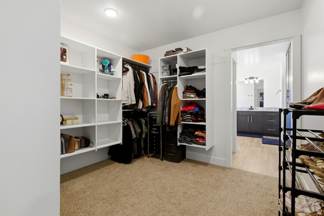 3902 West 825 North West Point, UT 84015 - Photo 16 of 49 Walk in closet with light carpet
