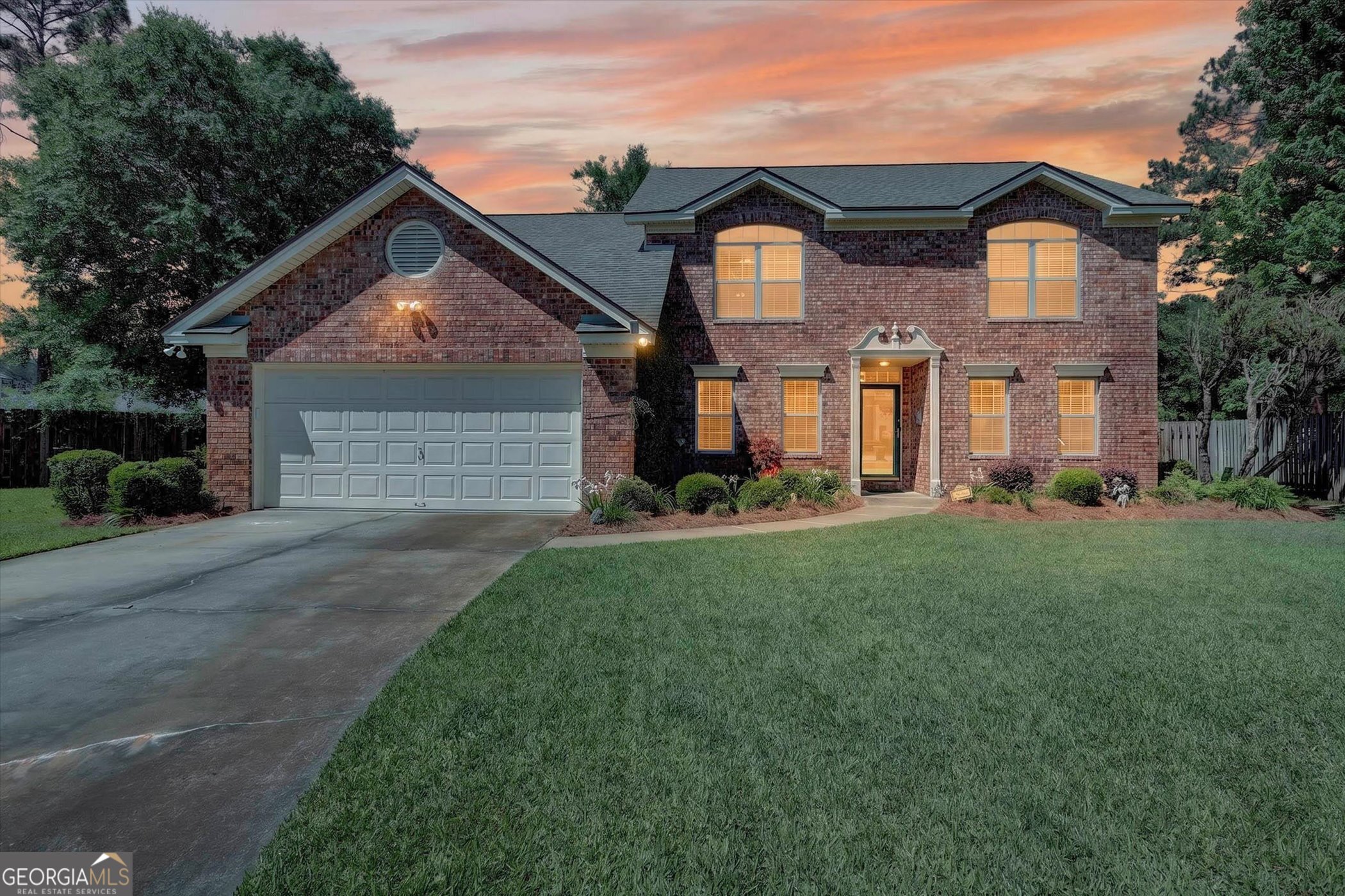 7 Towne Lake Court Pooler, GA 31322 - Photo 1 of 50 a front view of a house with a yard