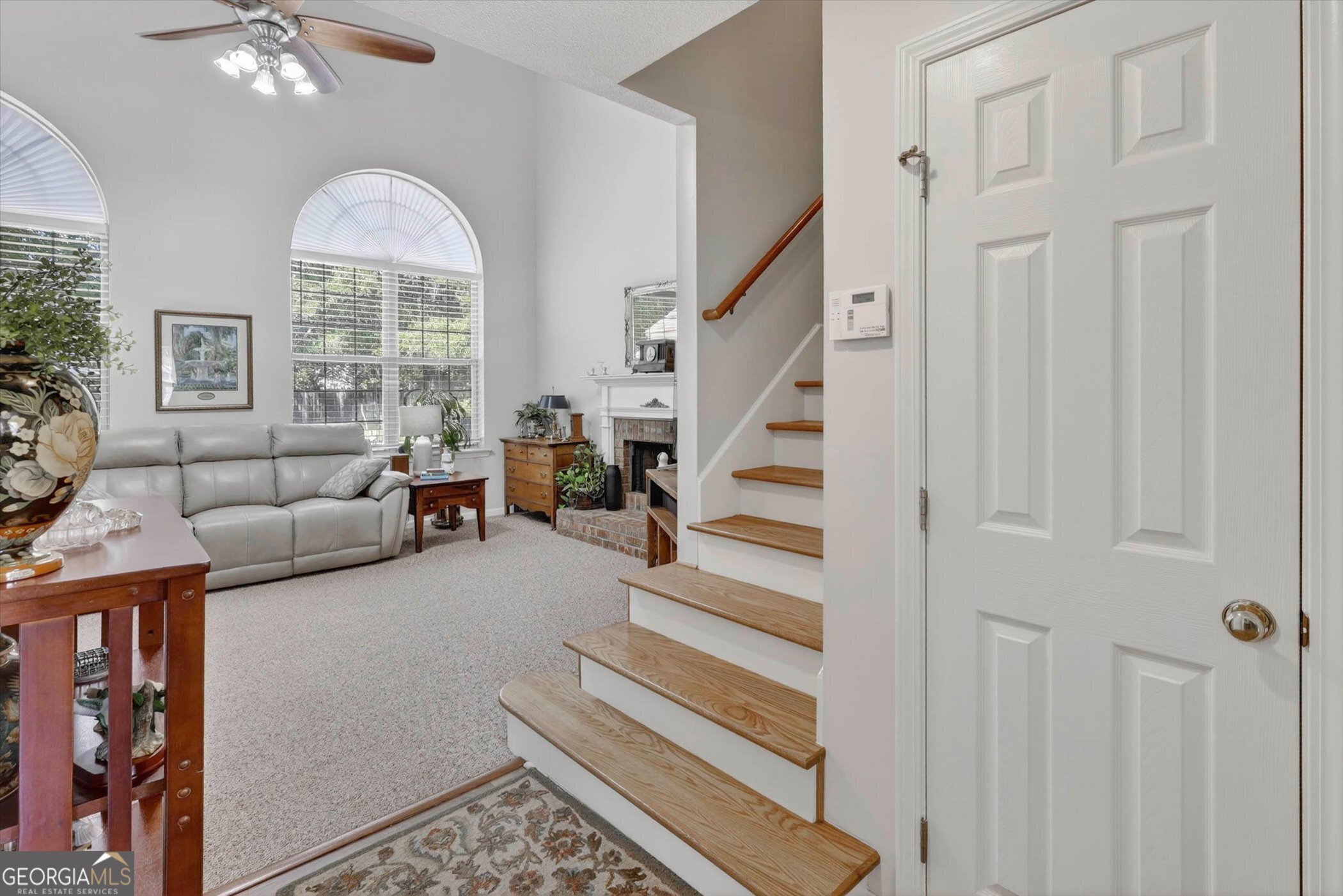 7 Towne Lake Court Pooler, GA 31322 - Photo 11 of 50 a living room with furniture and a large window