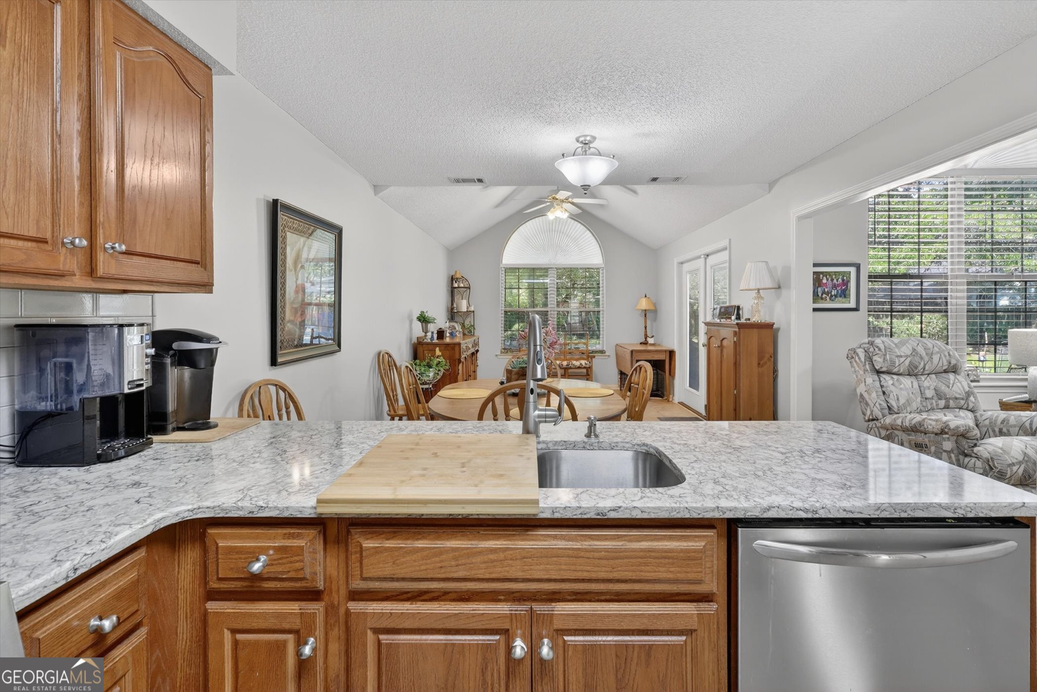 7 Towne Lake Court Pooler, GA 31322 - Photo 22 of 50 view of a kitchen with granite countertop a sink stainless steel appliances and cabinets