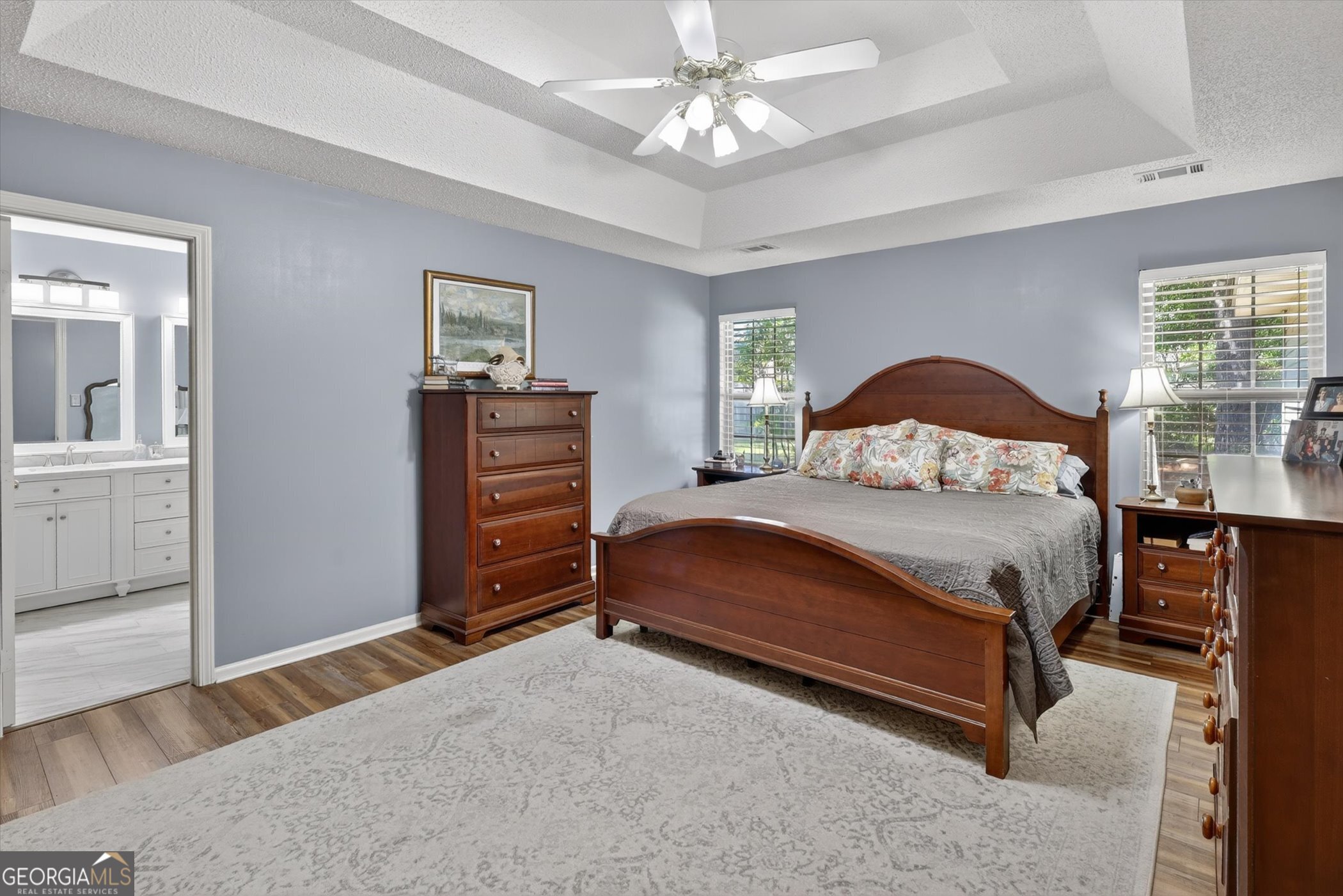 7 Towne Lake Court Pooler, GA 31322 - Photo 24 of 50 a bedroom with a bed and wooden floor