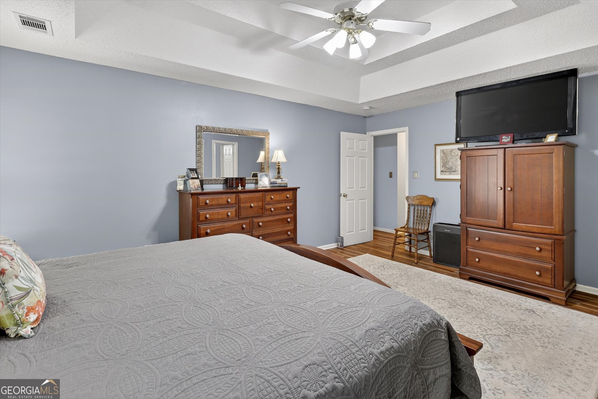 7 Towne Lake Court Pooler, GA 31322 - Photo 29 of 50 a bedroom with a bed and a flat screen tv