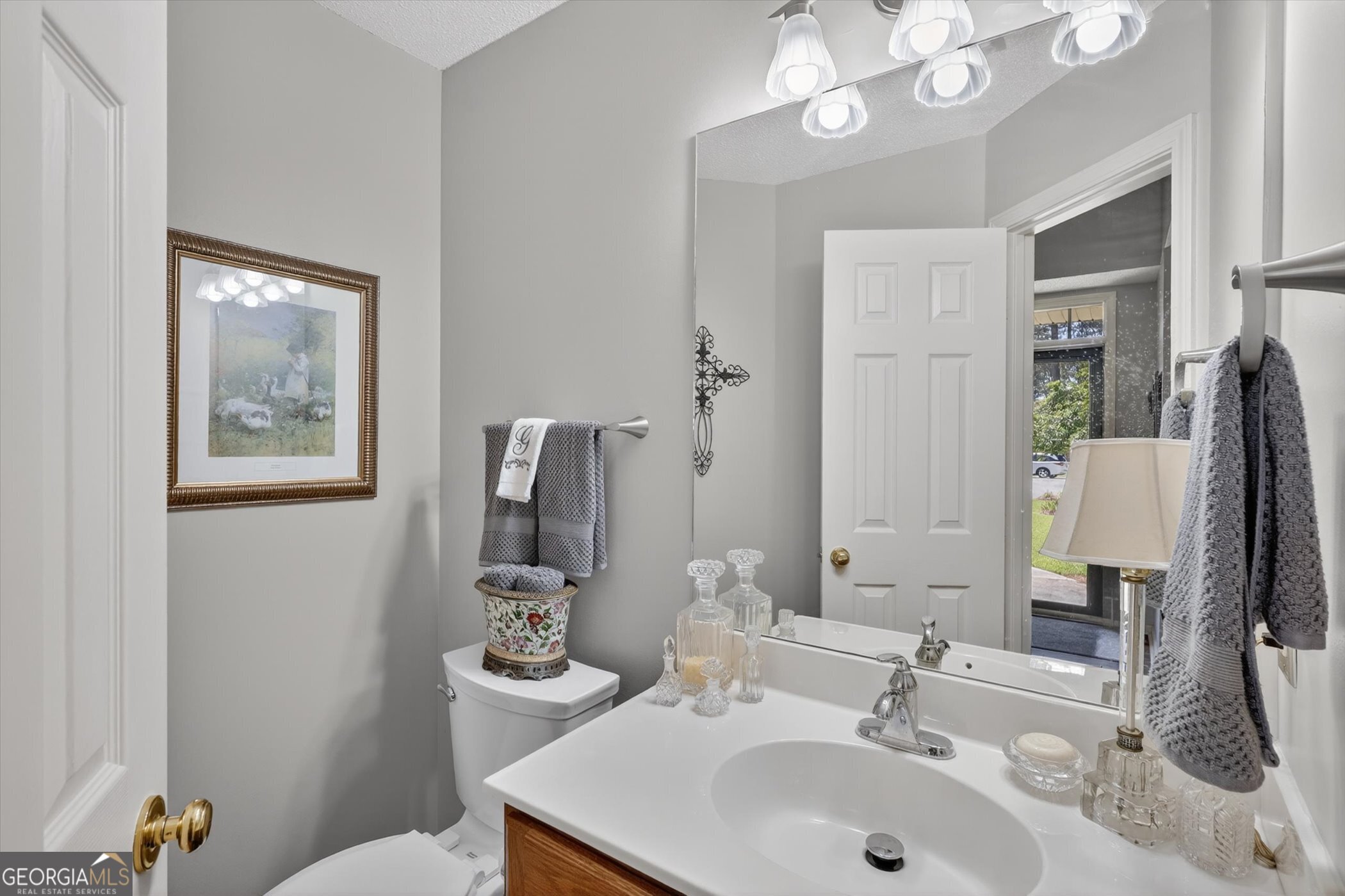 7 Towne Lake Court Pooler, GA 31322 - Photo 30 of 50 a bathroom with a sink vanity and a mirror