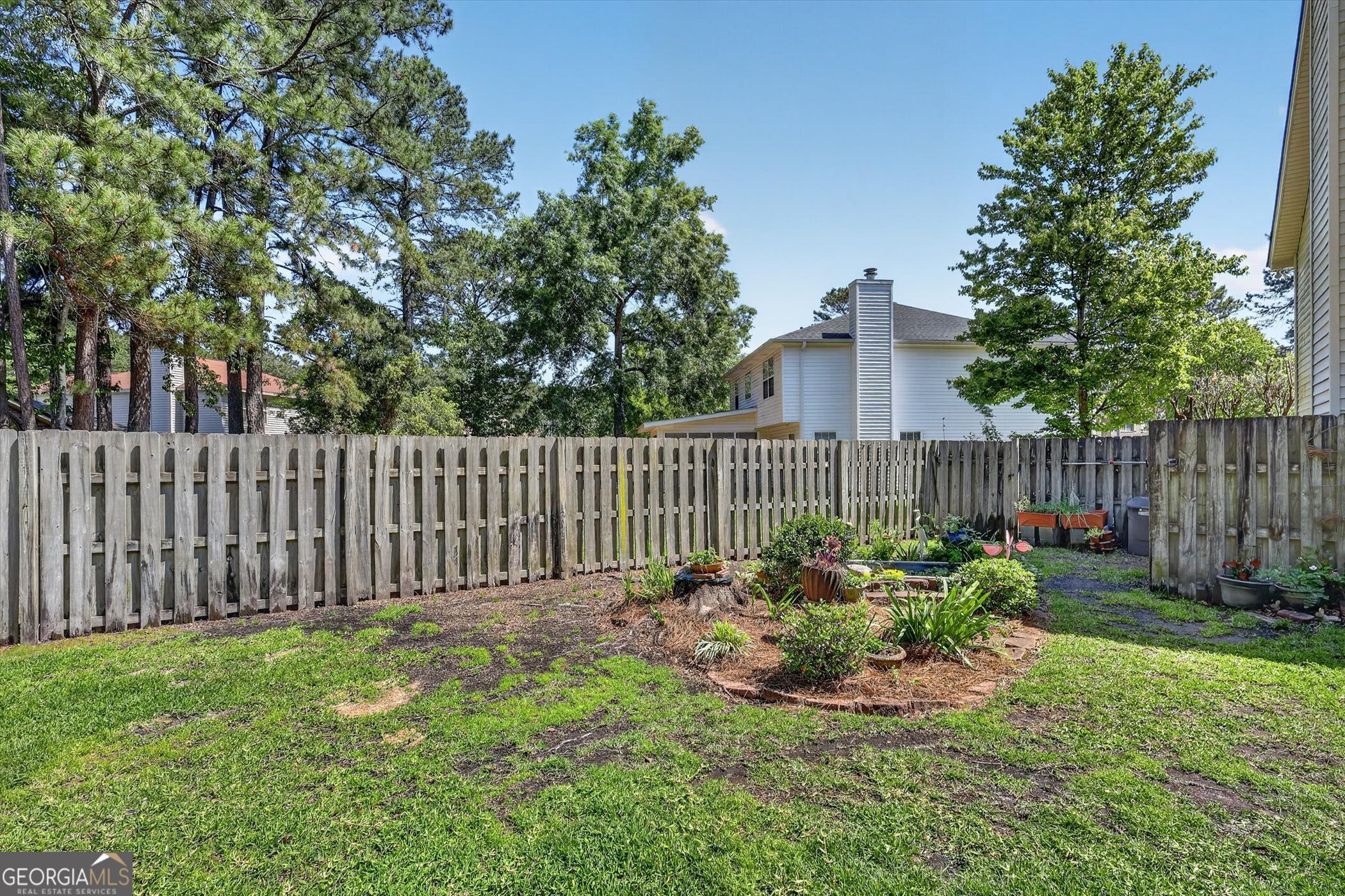 7 Towne Lake Court Pooler, GA 31322 - Photo 50 of 50 a view of a backyard with a garden