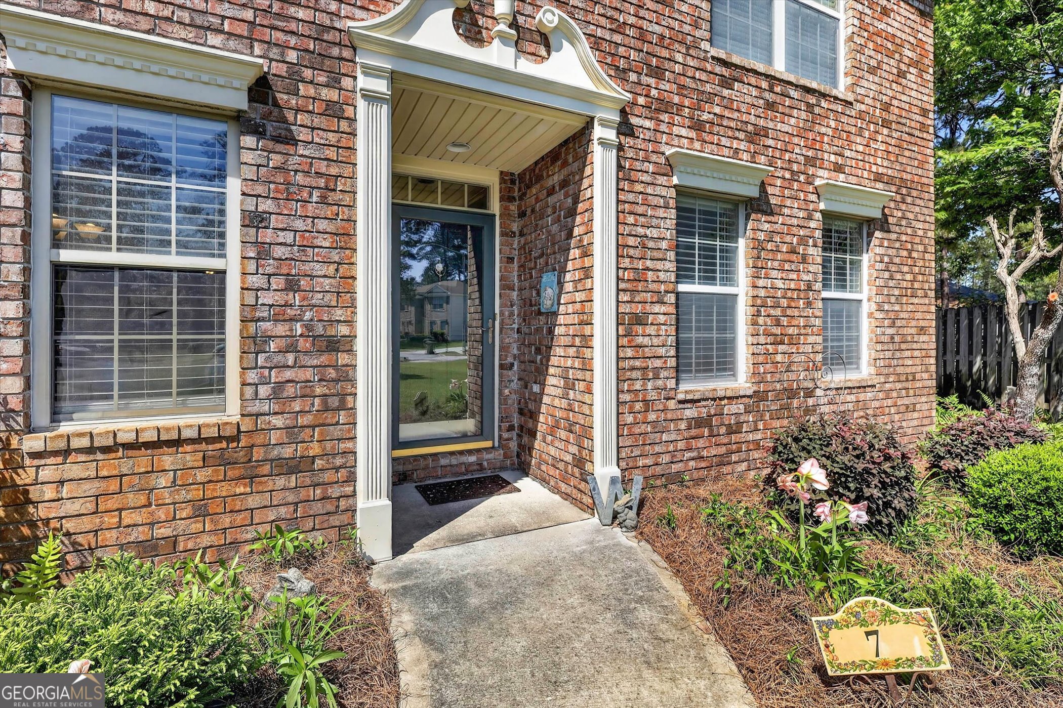 7 Towne Lake Court Pooler, GA 31322 - Photo 5 of 50 a view of entrance of the house and potted plants
