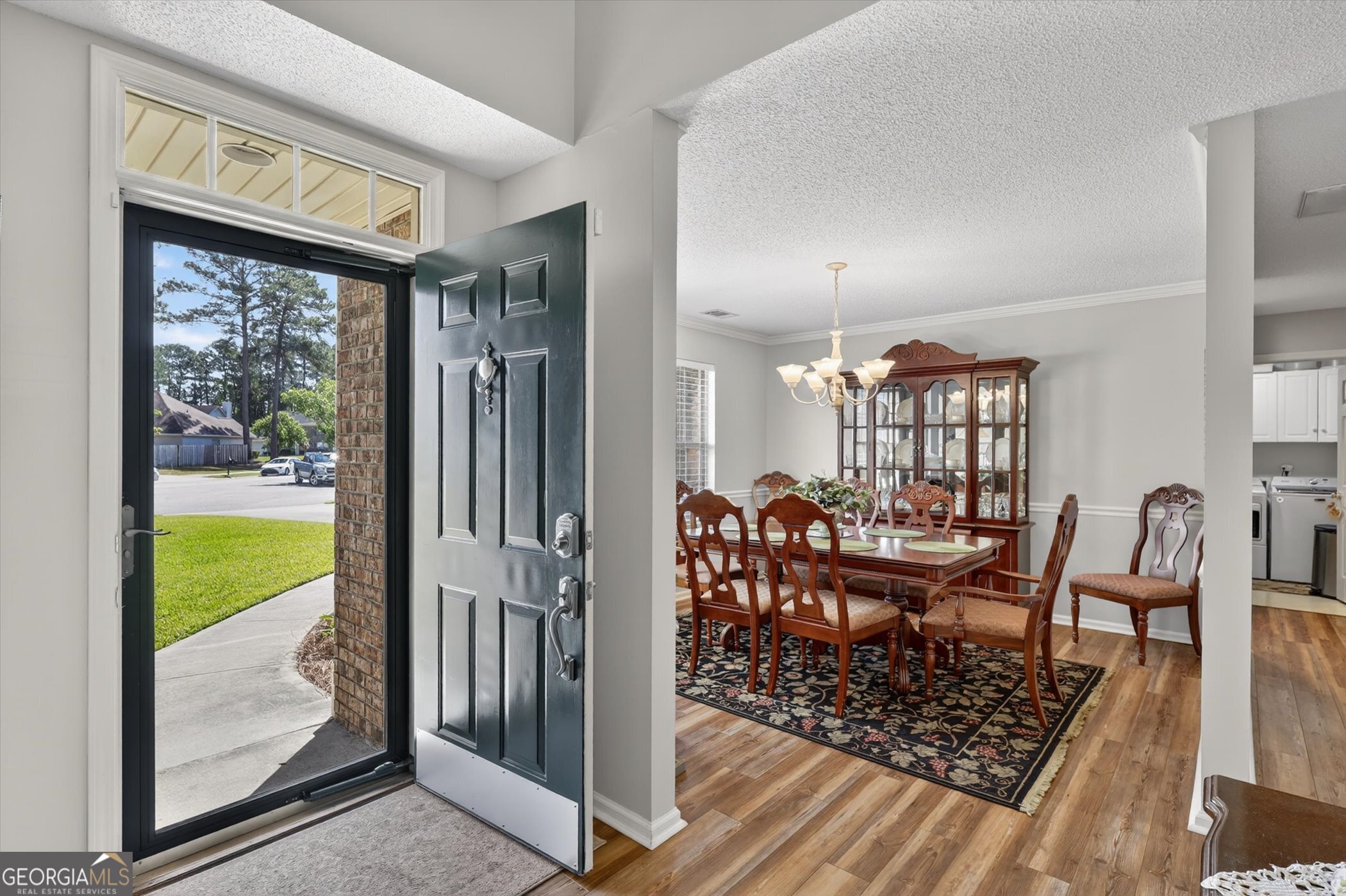 7 Towne Lake Court Pooler, GA 31322 - Photo 6 of 50 a view of a dining room with furniture window and wooden floor