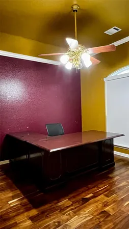 a room with table and chairs