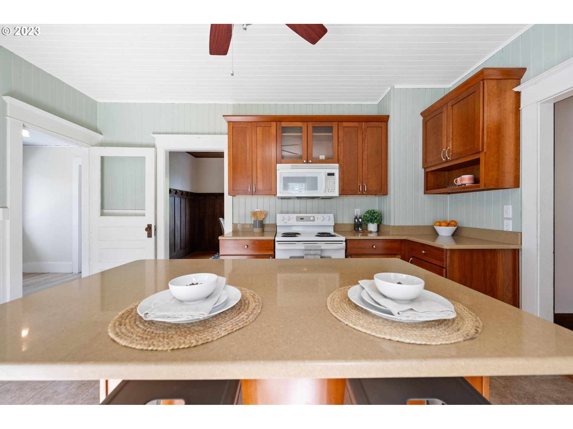 531 35th Street Astoria, OR 97103 - Photo 11 of 37 a kitchen with a table and chairs in it