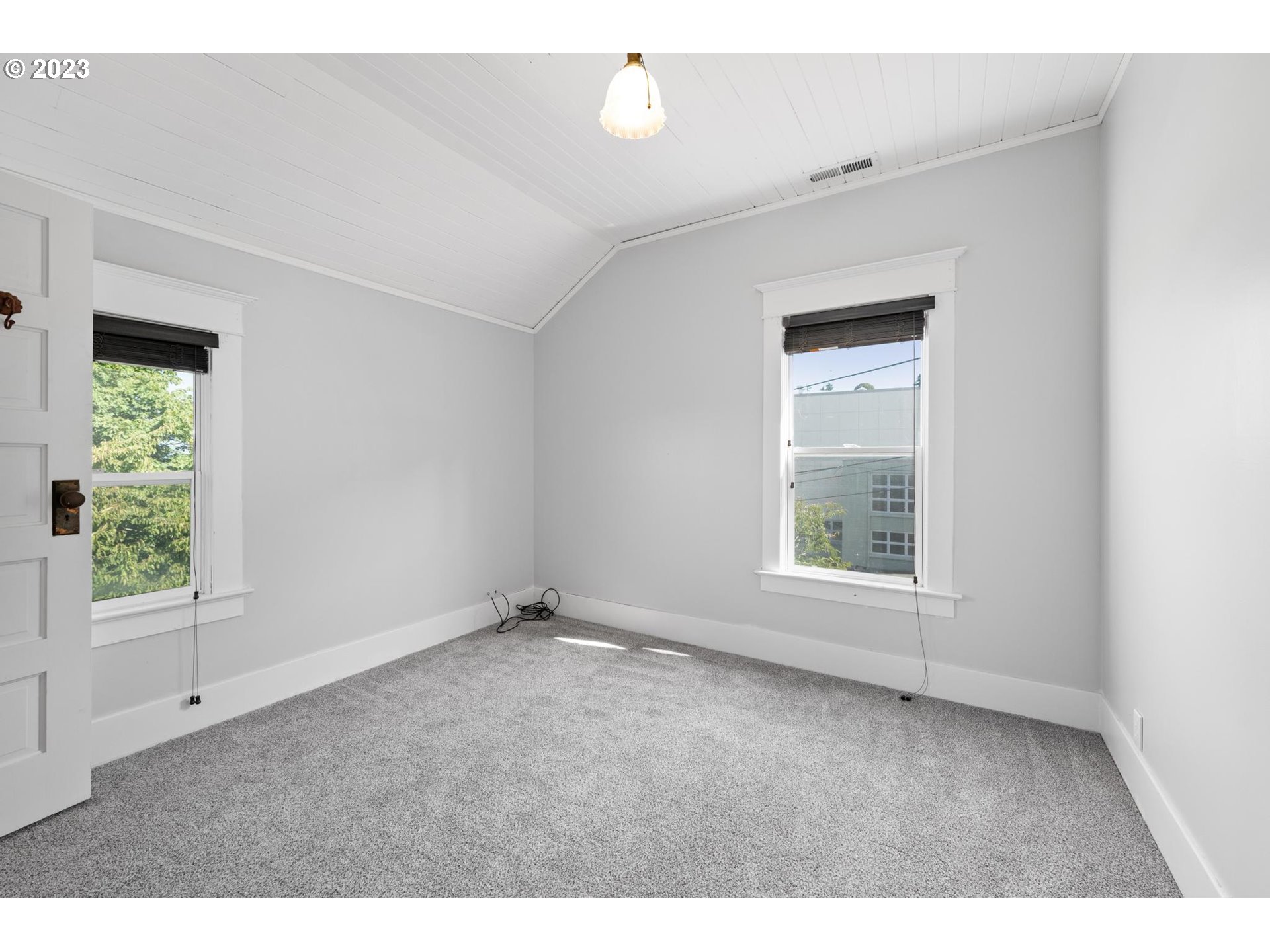 531 35th Street Astoria, OR 97103 - Photo 23 of 37 a view of an empty room with a window