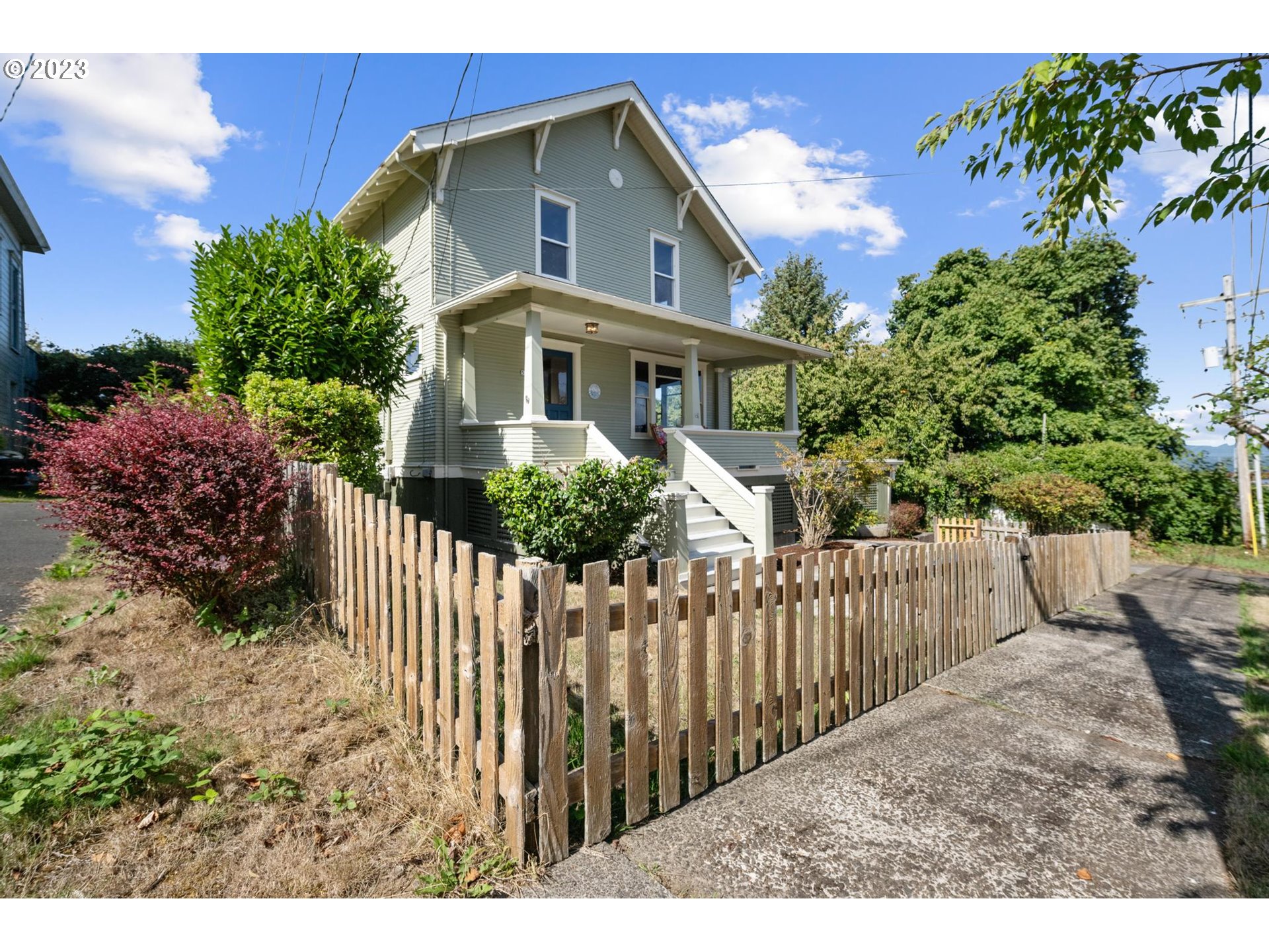 531 35th Street Astoria, OR 97103 - Photo 29 of 37 a front view of a house with wooden fence