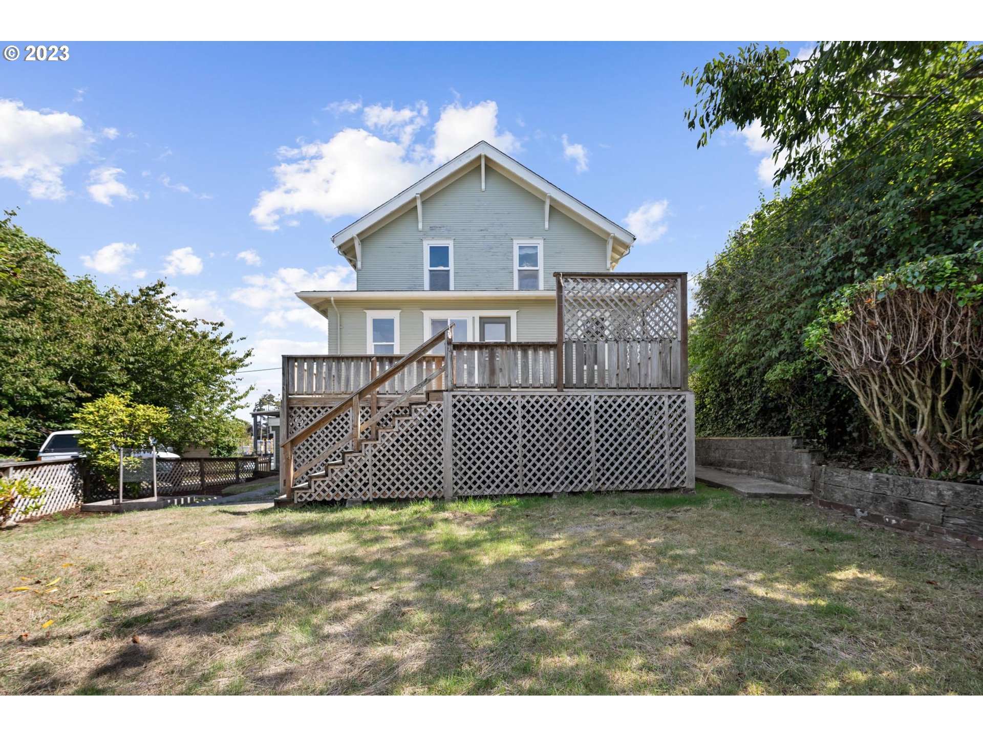 531 35th Street Astoria, OR 97103 - Photo 31 of 37 a view of a house with a yard