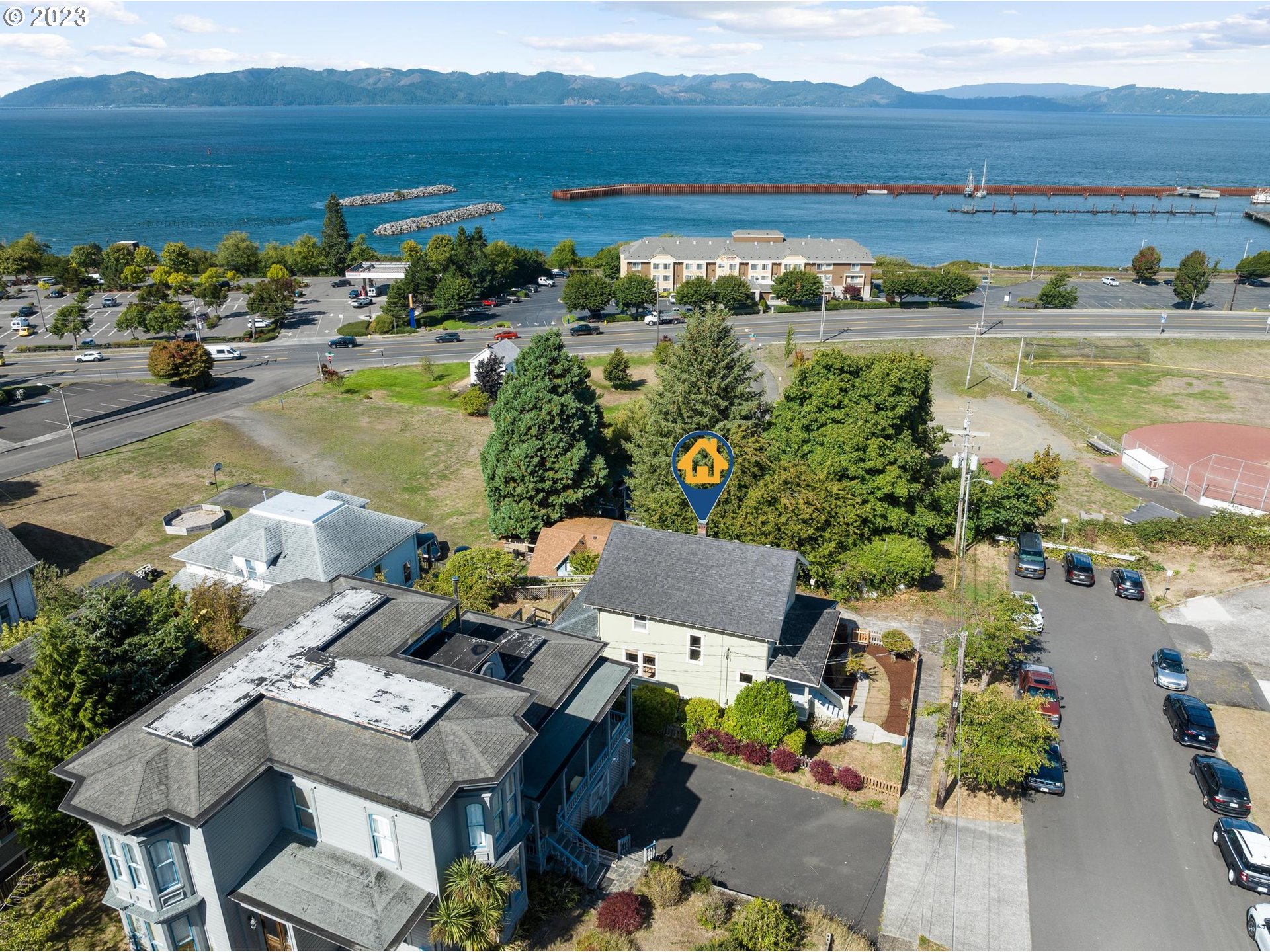 531 35th Street Astoria, OR 97103 - Photo 34 of 37 a view of a lake with a mountain