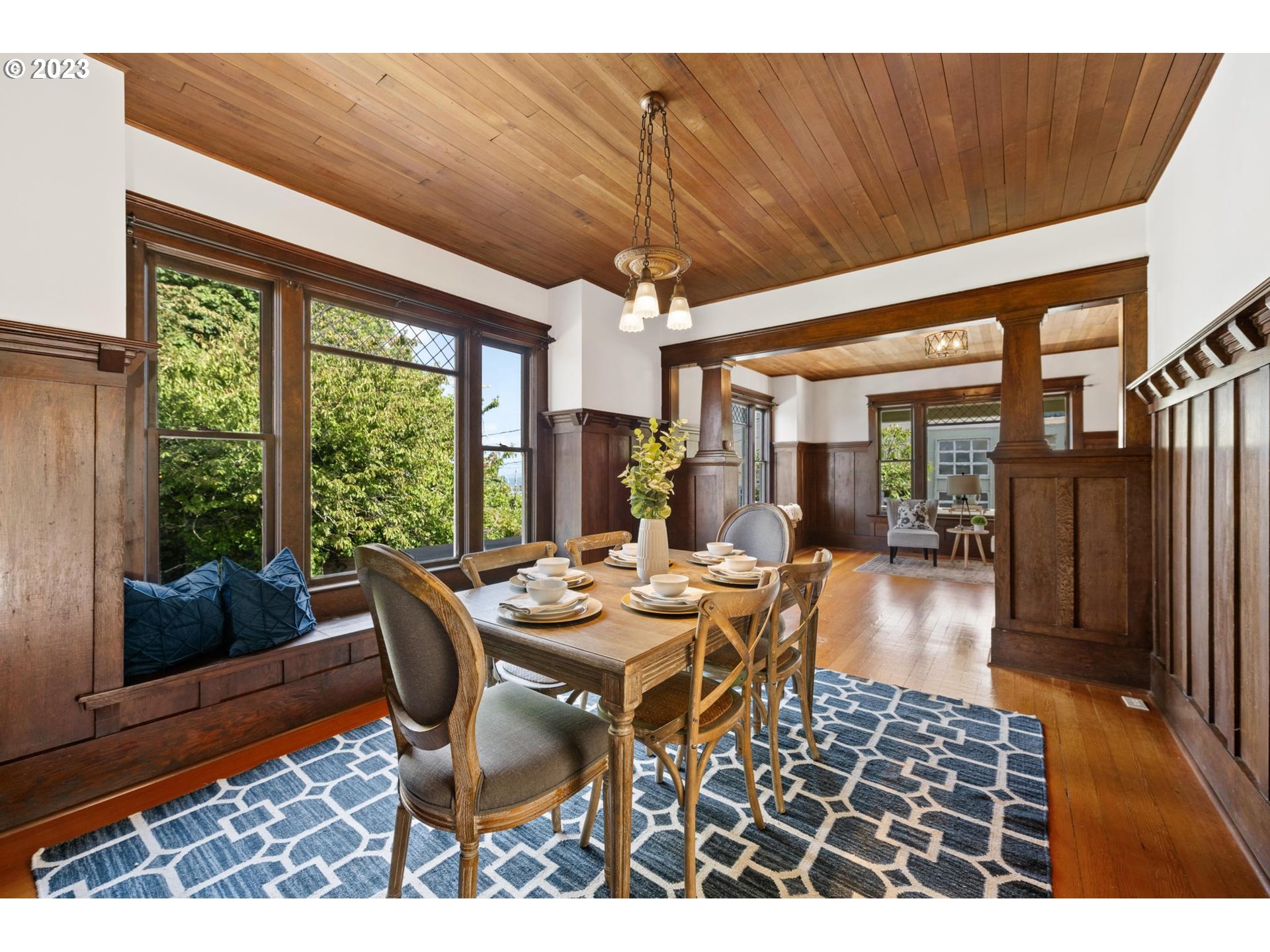531 35th Street Astoria, OR 97103 - Photo 7 of 37 a dining room with furniture wooden floor and a rug