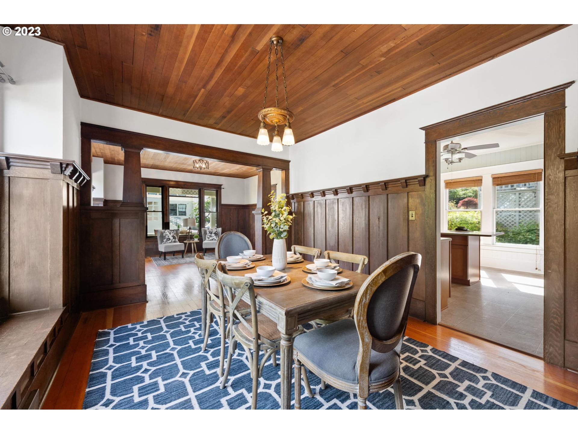 531 35th Street Astoria, OR 97103 - Photo 8 of 37 a dining room with furniture a rug and wooden floor