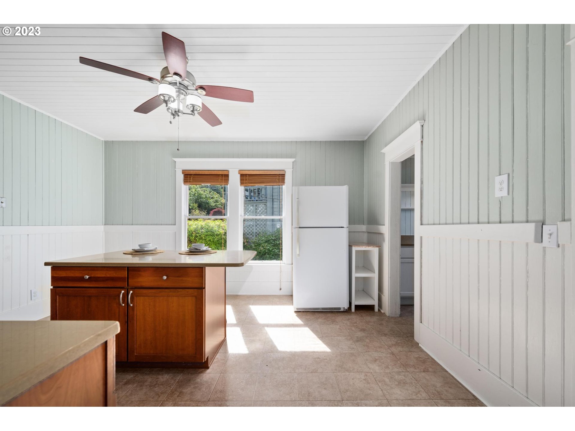 531 35th Street Astoria, OR 97103 - Photo 10 of 37 a kitchen with a sink and refrigerator