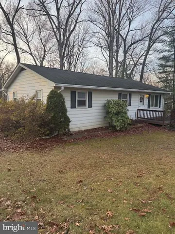front view of house with a yard