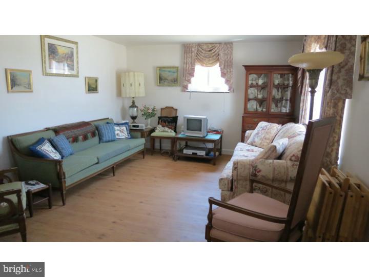 950 Chesterfield Road Barrington, NJ 08033 - Photo 2 of 14 a living room with furniture and a window