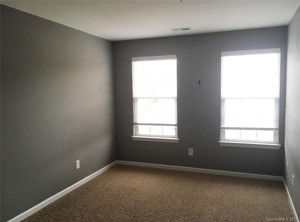 751 Prospect Lane, Unit 37 Fort Mill, SC 29708 - Photo 9 of 12 an empty room with a window