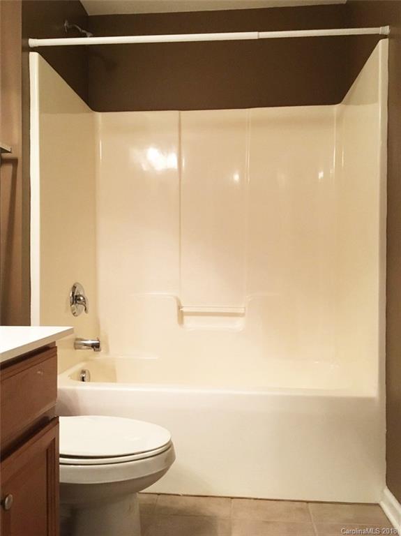 751 Prospect Lane, Unit 37 Fort Mill, SC 29708 - Photo 10 of 12 a bathroom with a toilet a sink and a bathtub
