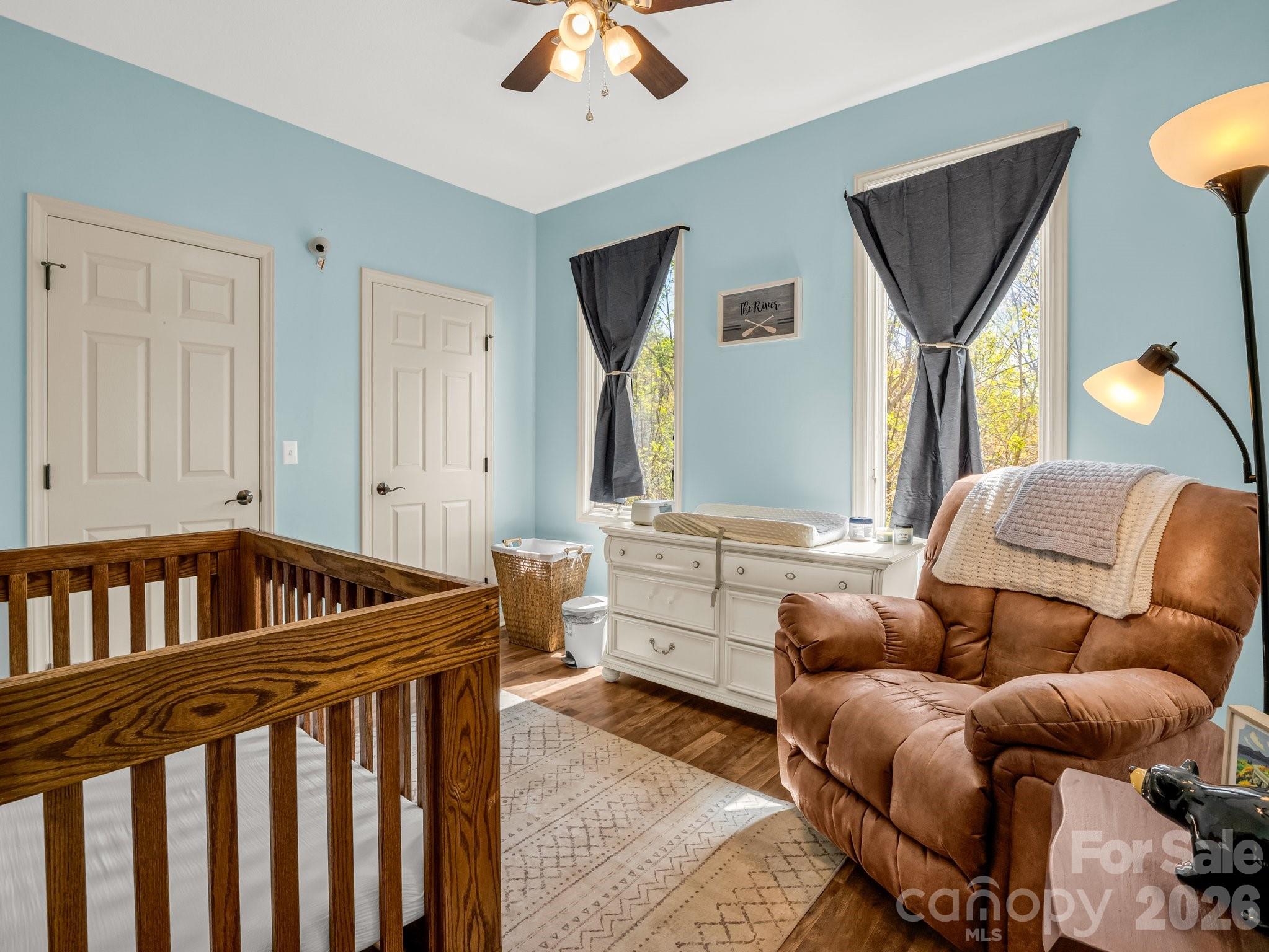 1424 Wolf Pen Road Old Fort, NC 28762 - Photo 24 of 45 a living room with furniture and a window