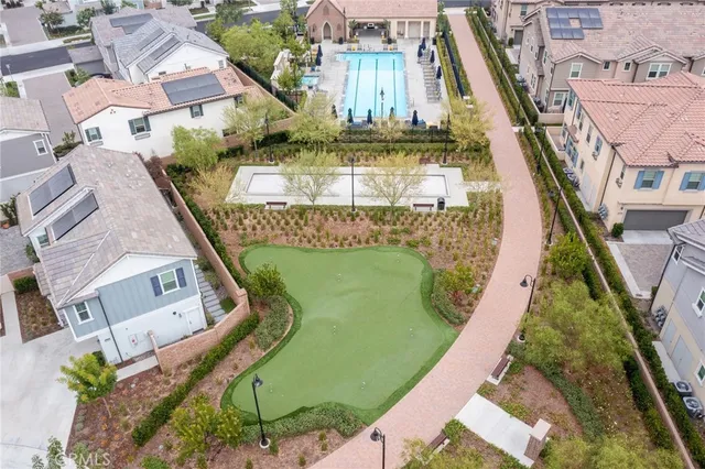 an aerial view of a house with a garden