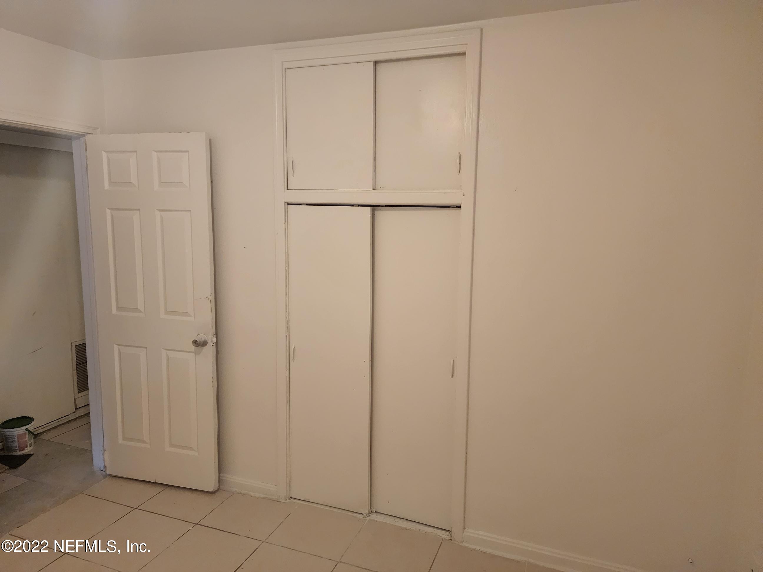 1914 Rogero Road Jacksonville, FL 32211 - Photo 4 of 18 a view of a closet area