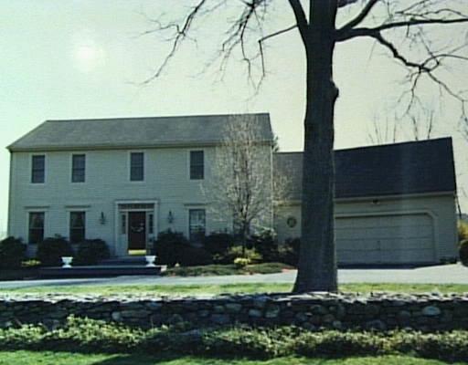 9 Windwood Road Brookfield, CT 06804 - Photo 1 of 1 a front view of a house with a yard