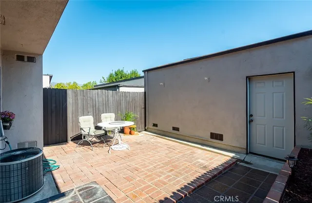 a front view of a house with patio