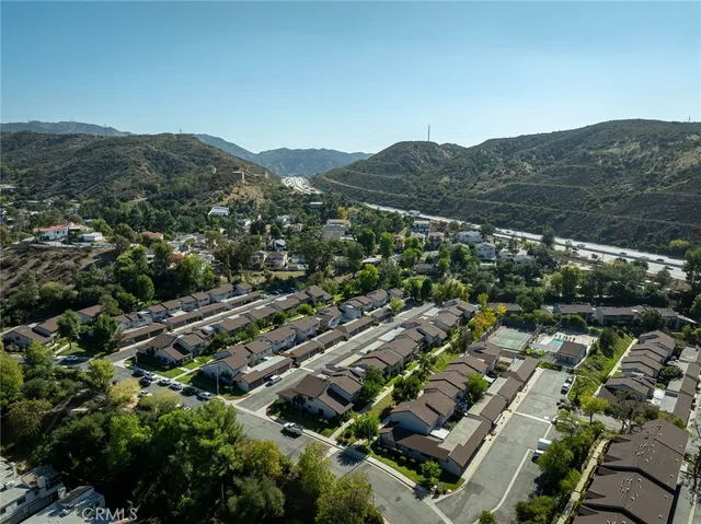 an aerial view of residential house with outdoor space