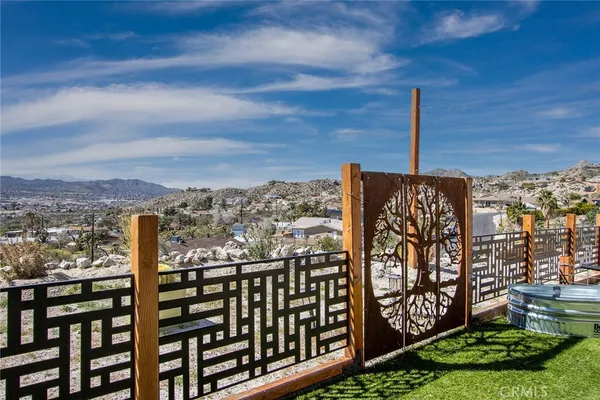 a view of a balcony with city view