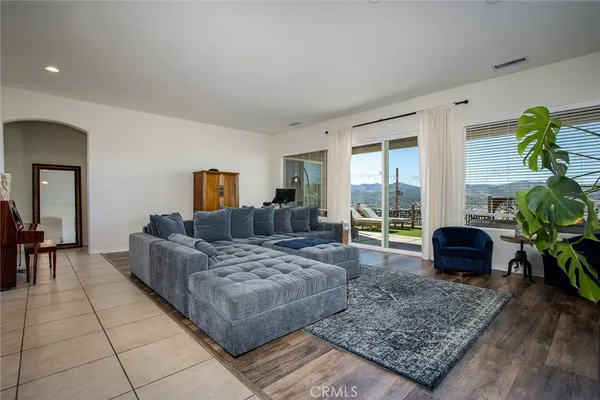 a living room with furniture and a couch