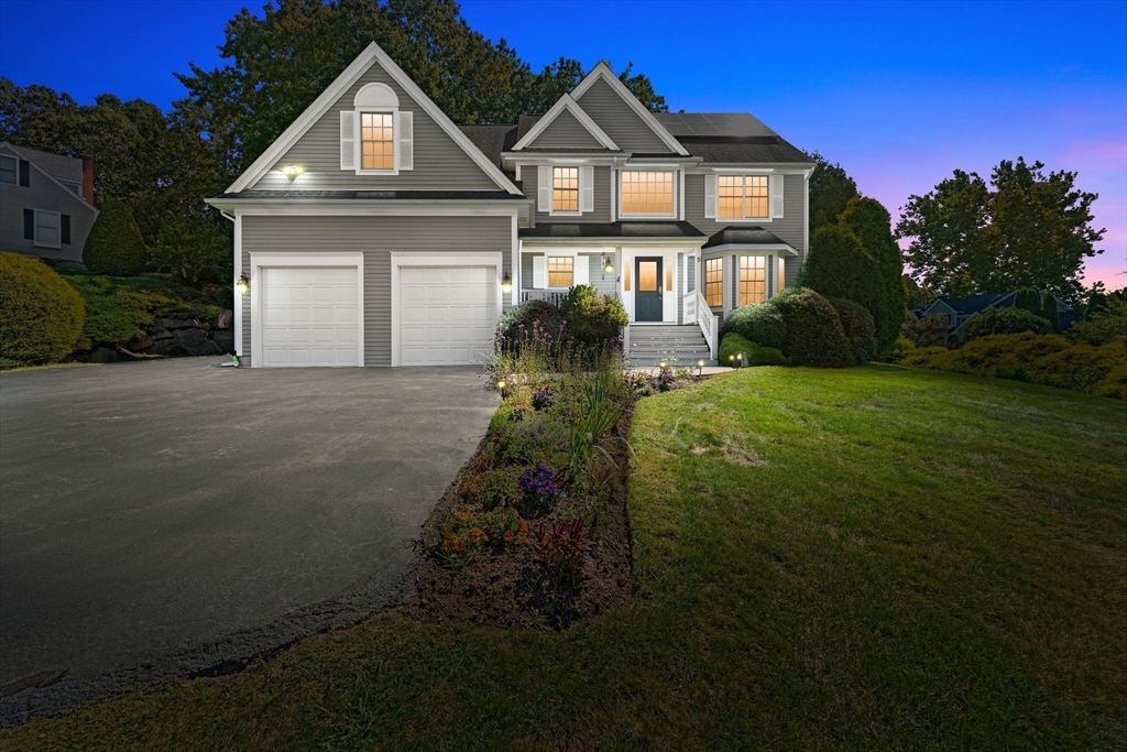 5 Spring House Lane Cumberland, RI 02864 - Photo 1 of 34 a front view of a house with a yard